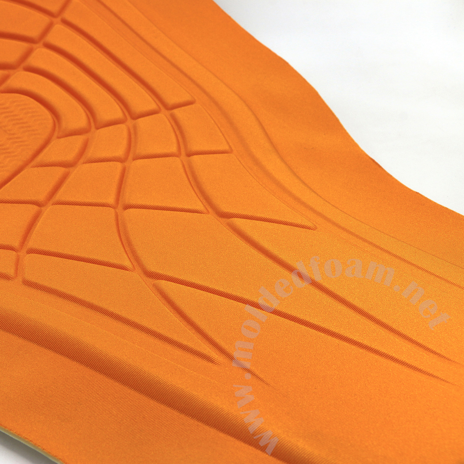 Compression molded white TPE foam for ION harness inner skin with orange lycra fabric